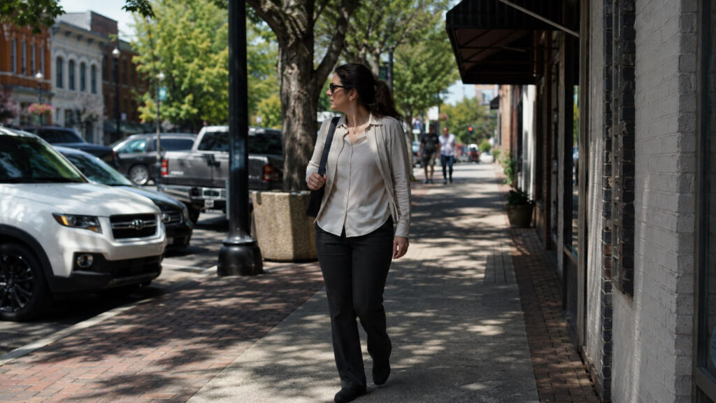 Private investigator conducting discreet surveillance and GPS tracking in Marietta from inside a vehicle.